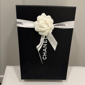 CHANEL Elegant Black Gift Box with White Ribbon and Camellia